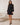 Kurzes Spitzenkleid für Damen mit drapiertem Taillenbereich und Rüschen - Schwarz