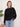 Pull Femme à Col Polo et Détails Contrastés – Noir
