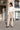 Damenjeans mit hoher Taille und weitem Bein mit Knopfdetails - Dunkelbeige